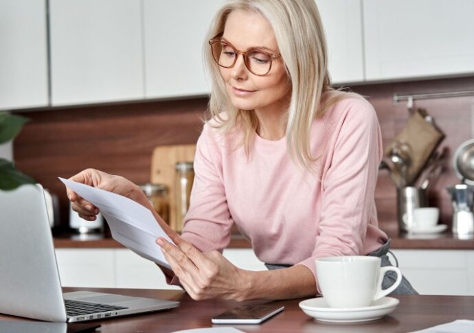 Woman registering for ClickPay in her new home