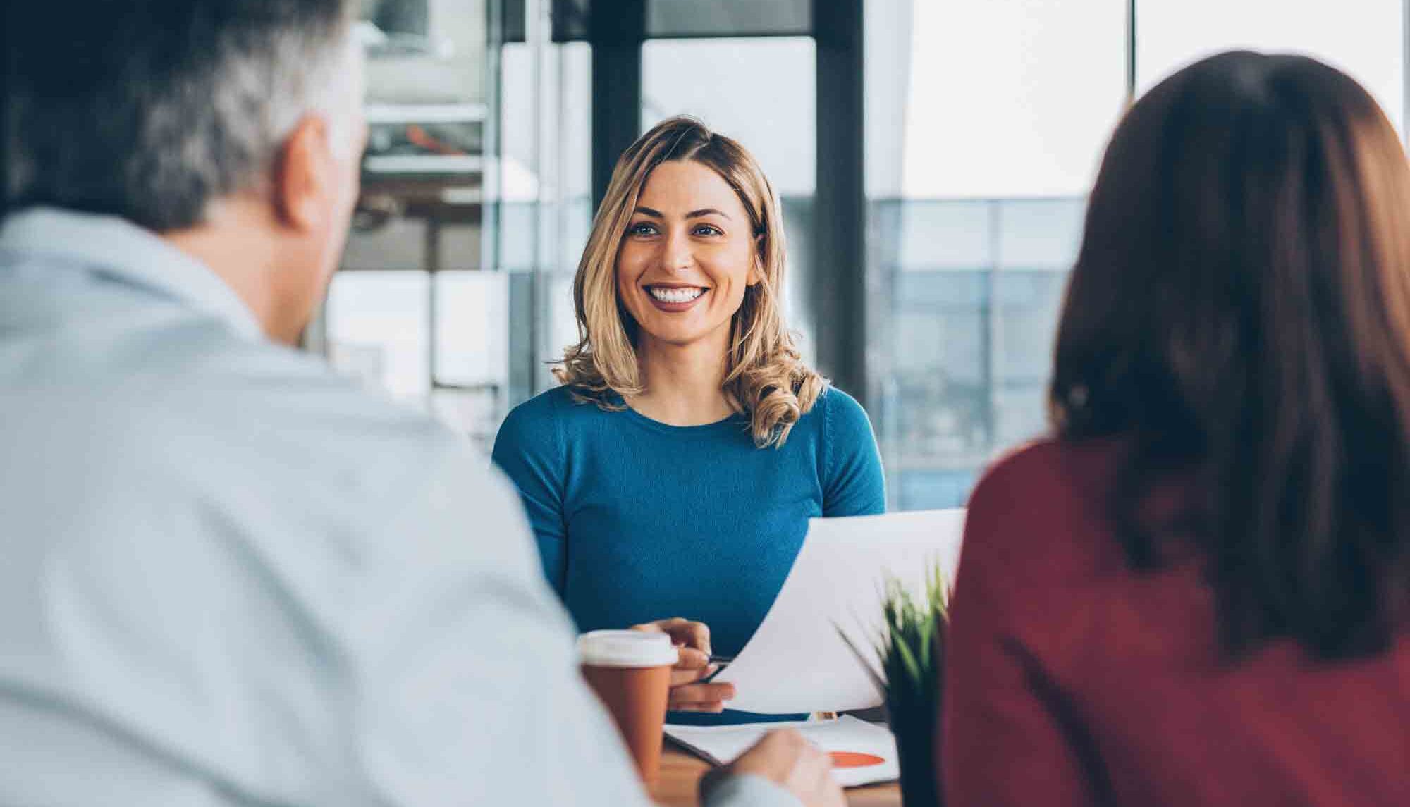 Sales department conducting a closing for a new home