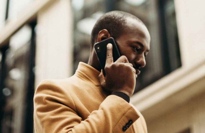 Man making an emergency phone call