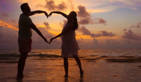photo of a young couple on the beach