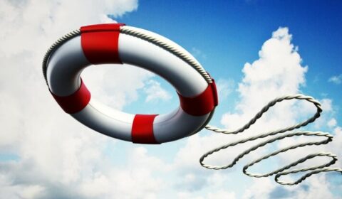 photo of a life saver being thrown in the air